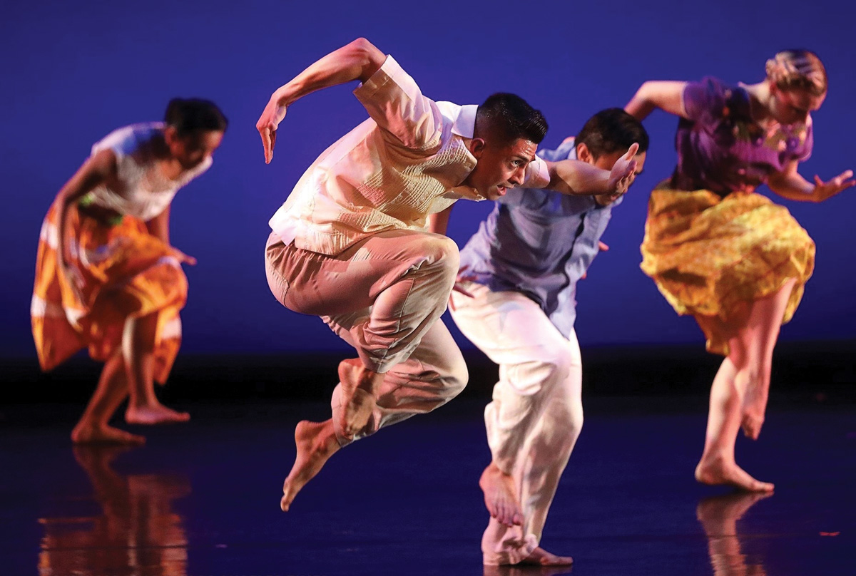 Edgar Aguirre performs with UCI’s Etude Ensemble in “Uprooted  Pero: Replantado,” choreographed by Donald McKayle. 