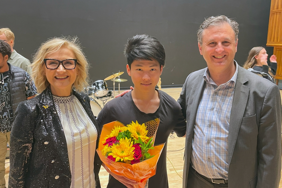 Claire Trevor Dean of the Arts Tiffany López, double engineering and music major Taesung Hwang, and Pacific Symphony President John Forsyte.