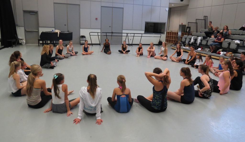 Graduate student mentors from the Dance Department and students from Dancetech discuss the improvisation class.