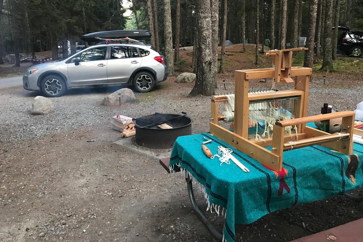  A view of a campsite during Ivy’s summerlong, 15,000-mile road trip. She acquired a small, portable loom to make some of her art.