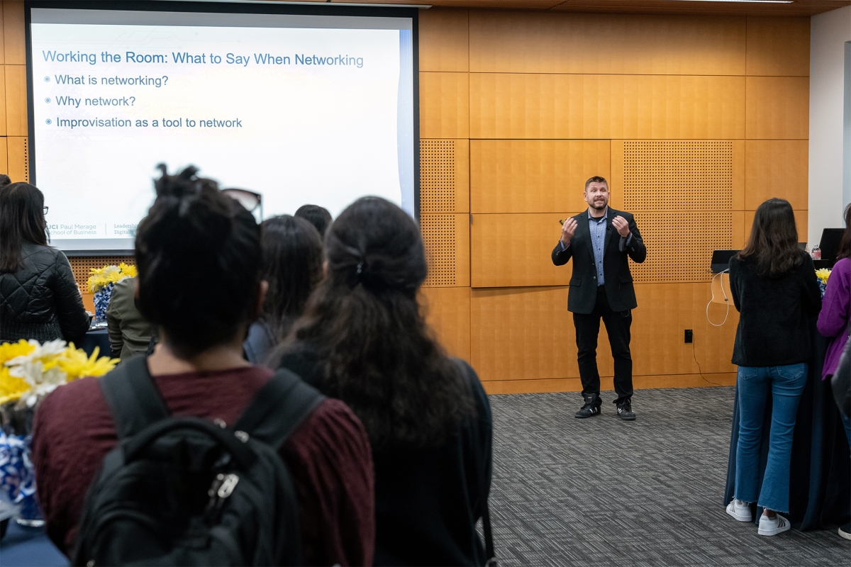  Professor Joel Veenstra teaches students from The Paul Merage School of Business the art of networking at a seminar at UCI