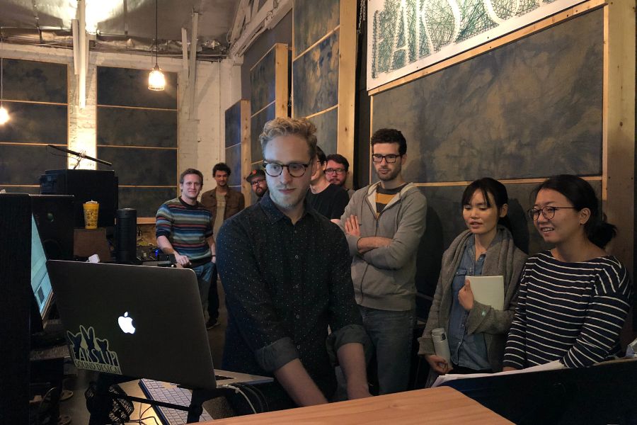 Mark Caspary gives graduate students from the Claire Trevor School of the Arts a tour of the Ears Up Sound Design Facility.