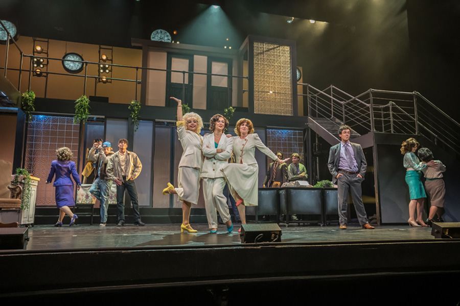 (left to right) Ashlyn Filippone, Sloan Ptashek and Ruby Lapeyre in a performance of 9 to 5: The Musical in the Irvine Barclay Theatre. 