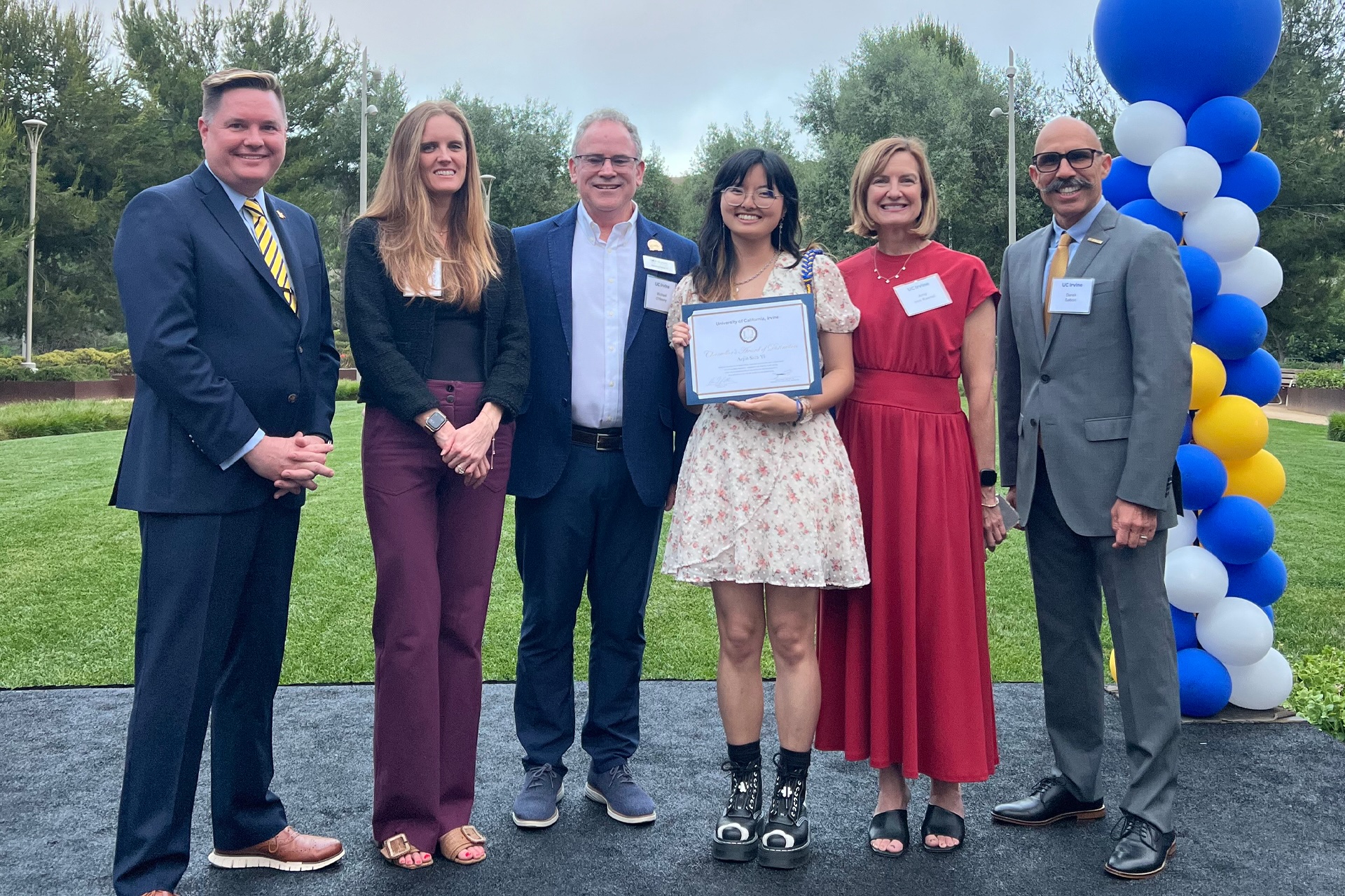 (center) Aejin Yi recognized by the UCI Alumni Association with a 2025 Chancellor’s Award of Distinction.