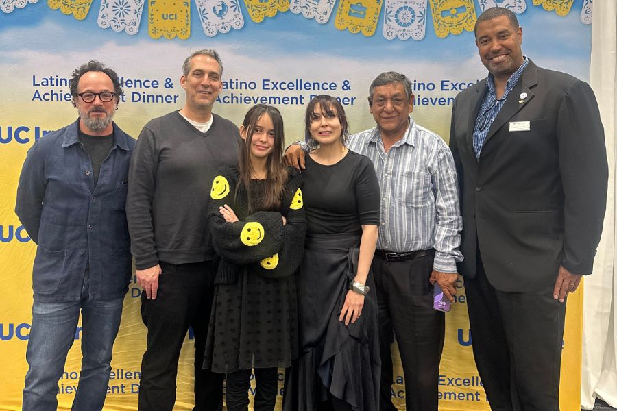 (left to right) Department of Art Chair Kevin Appel, Yadira Gonzalez-Dockstader's family and Claire Trevor School of the Arts Assistant Dean Jason Valdry.