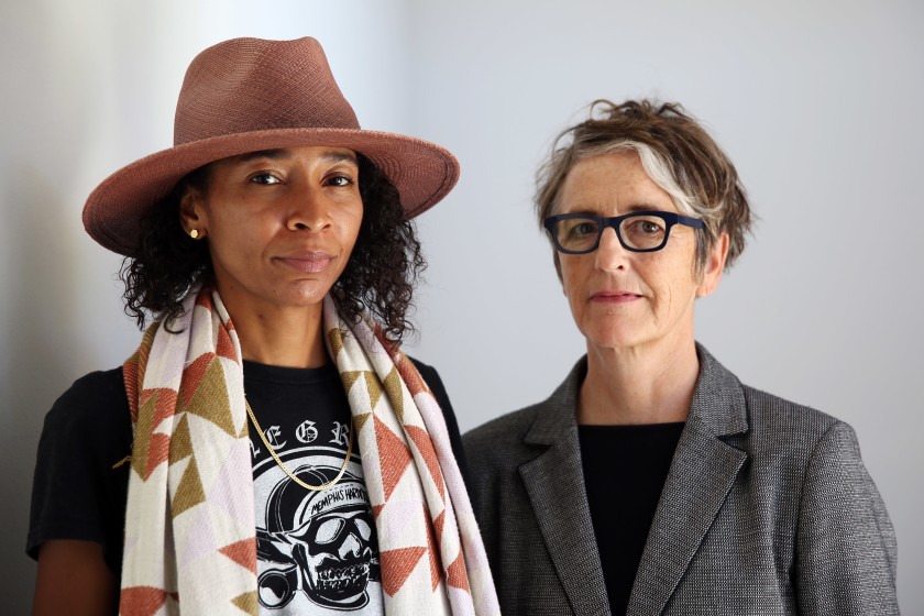 Artist lauren woods, left, who is protesting police violence against African Americans and curator Kimberli Meyer