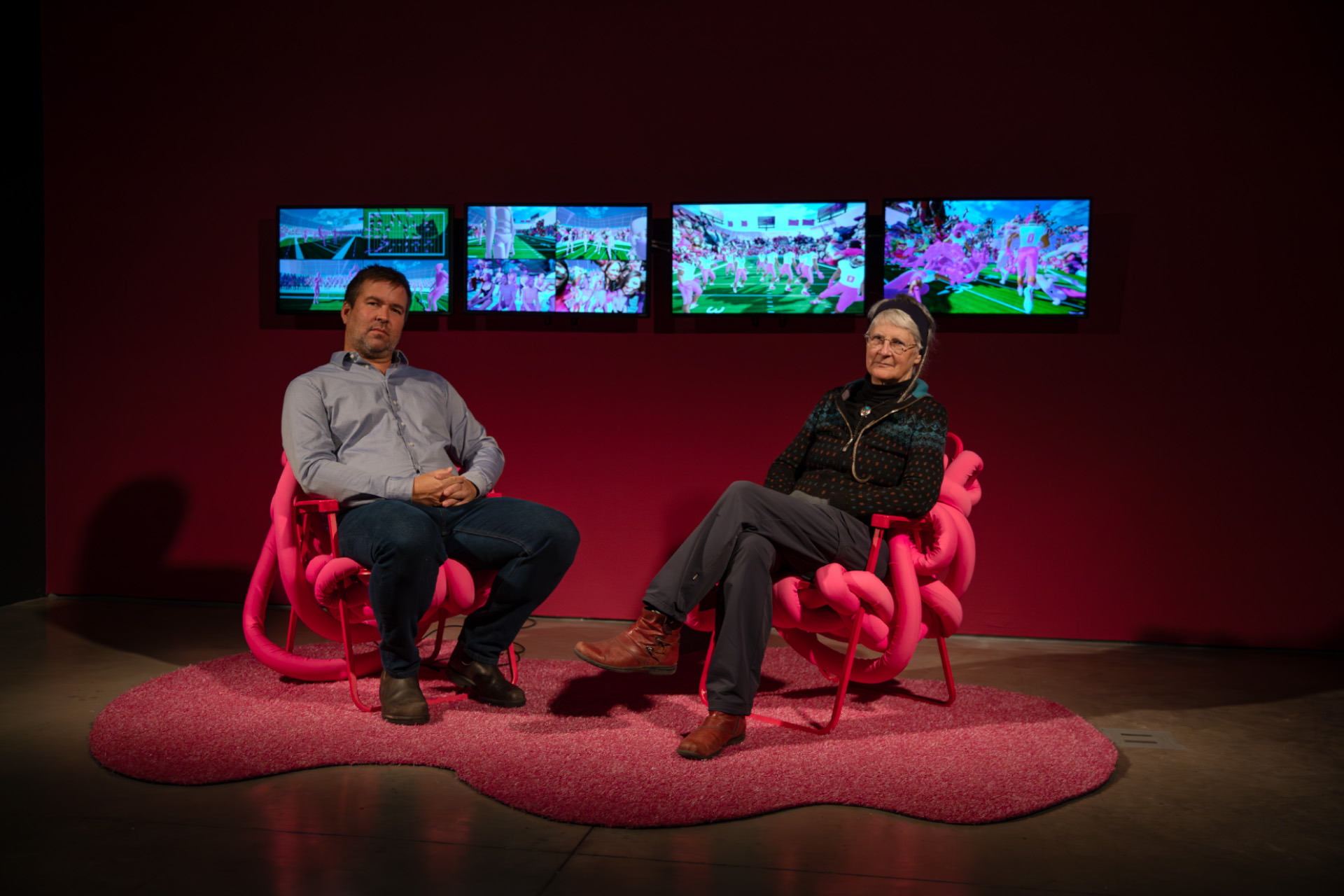  (left to right) Curators Jesse Colin Jackson and Antoinette LaFarge seated with Yvette Granata and Alina Nazmeeva’s Pregame, 2024, Interactive XR, multimedia. Photo by Emily Zheng.