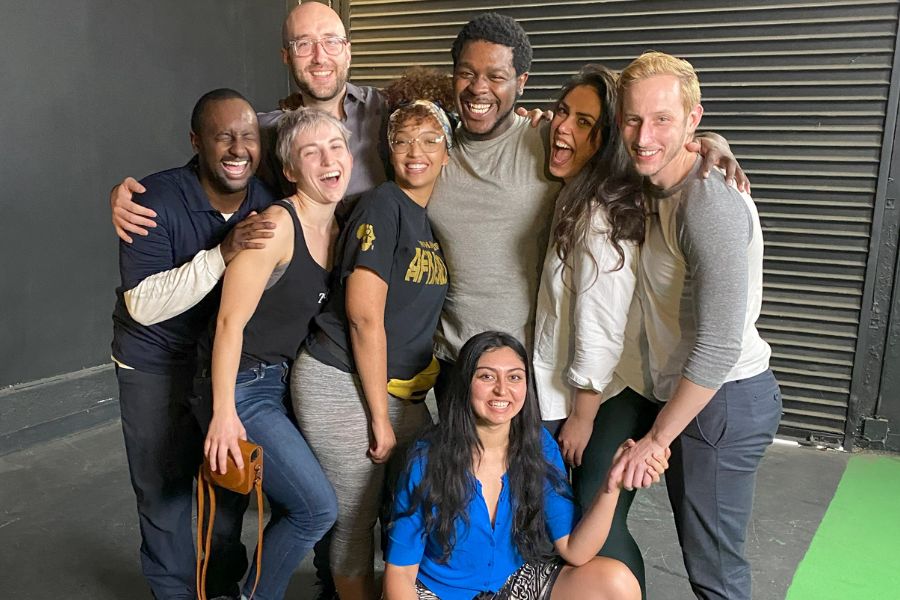 Sophia Metcalf (second from left) and the M.F.A. class of 2021 celebrates in the studio after a long day of shooting.