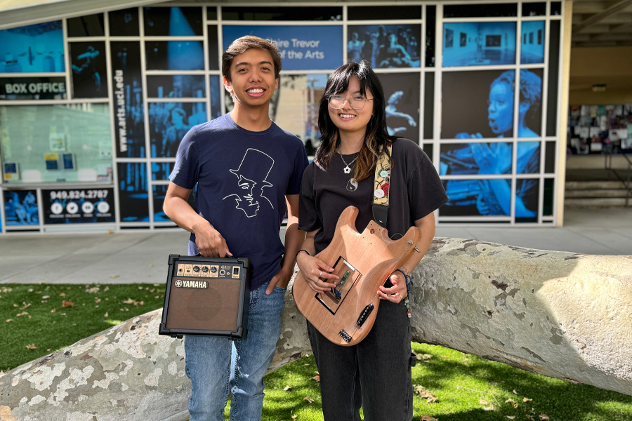 (left to right) Yasper De Jong and Aejin Yi with their project, The EXTAR (expression and guitar).