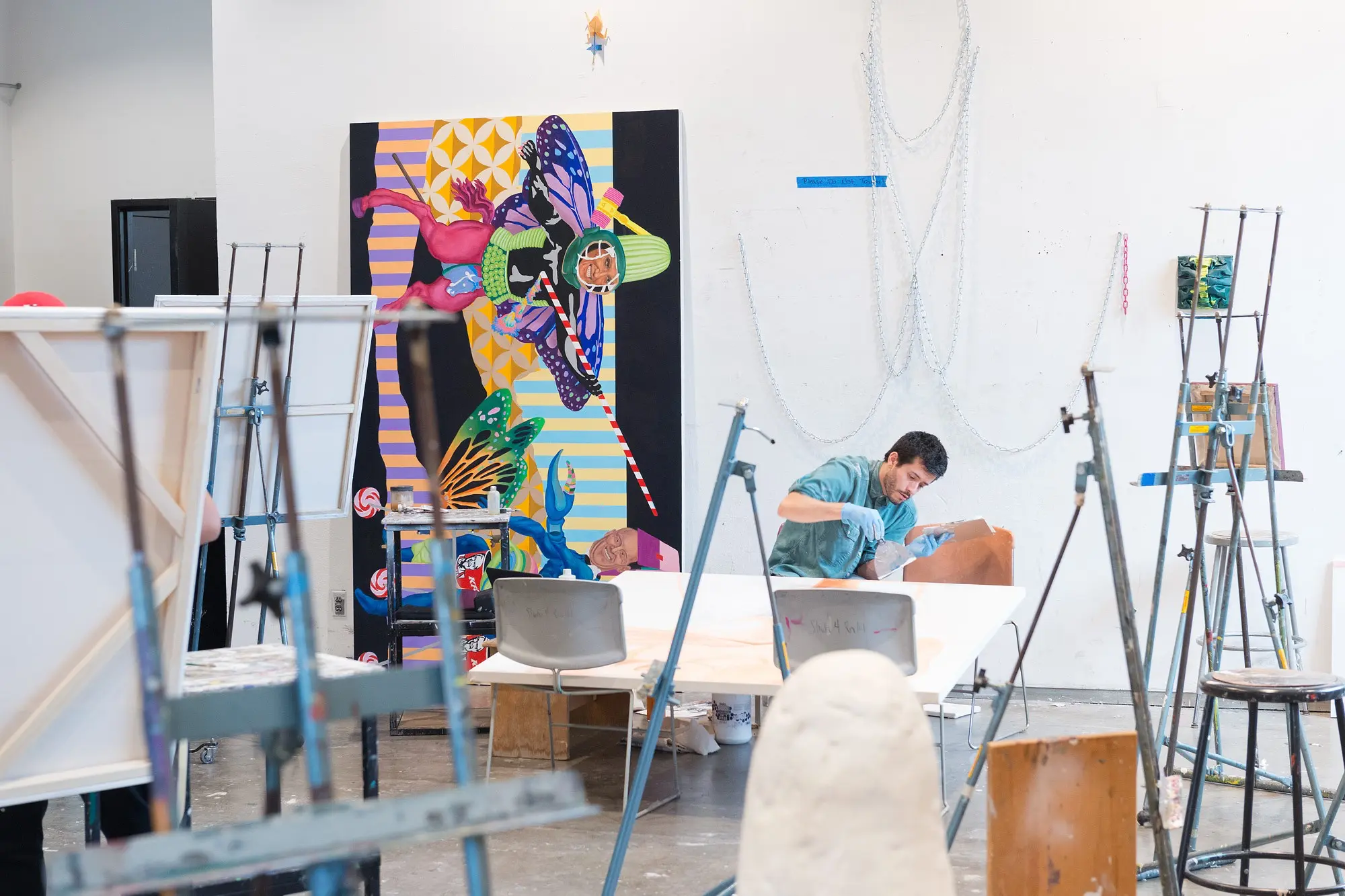 students creating in UCI art studio