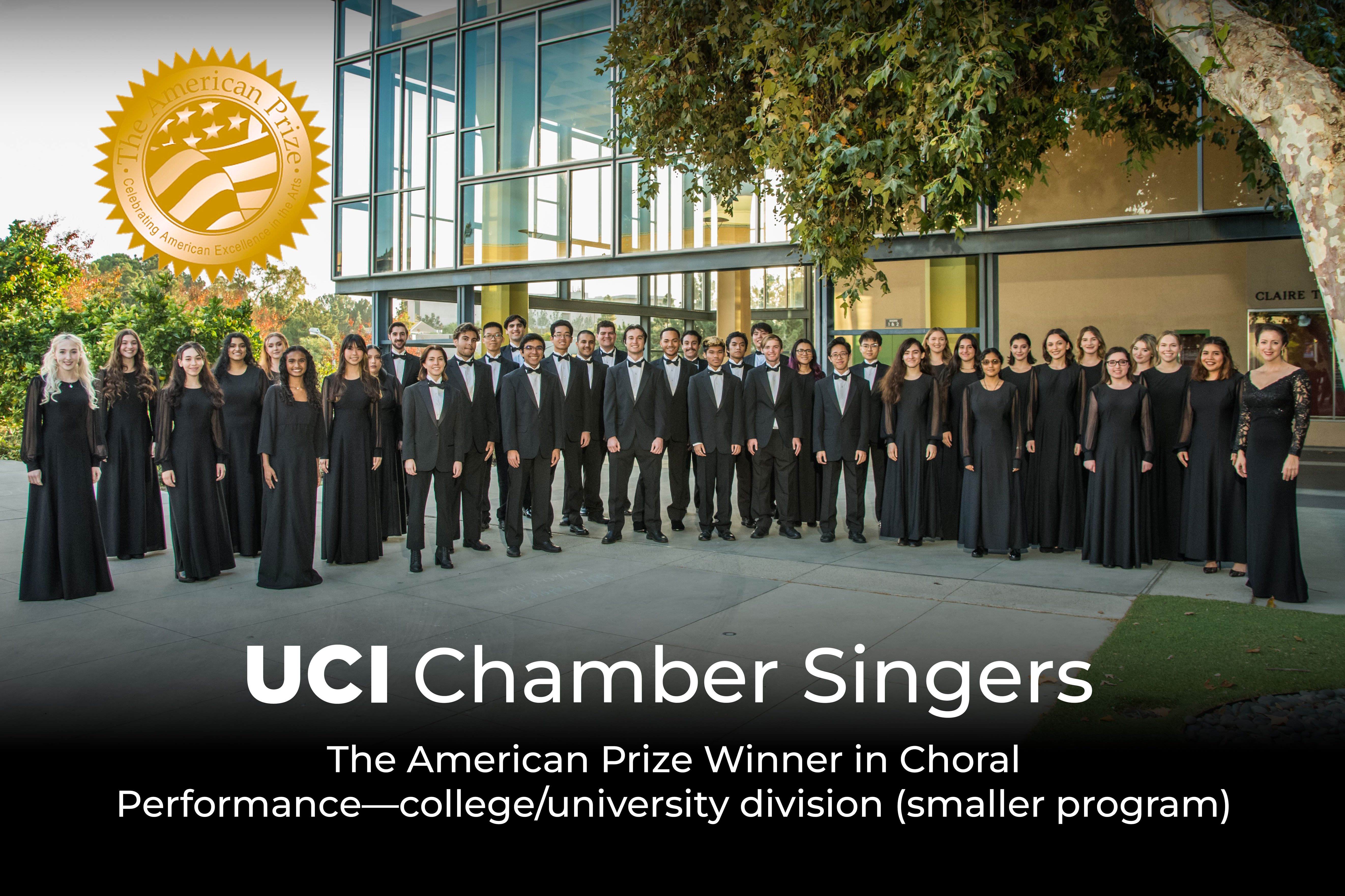 Group portrait of the UCI Chamber Singers standing outdoors in formal black attire in front of Claire Trevor Theatre, with text noting they are The American Prize winner in choral performance.