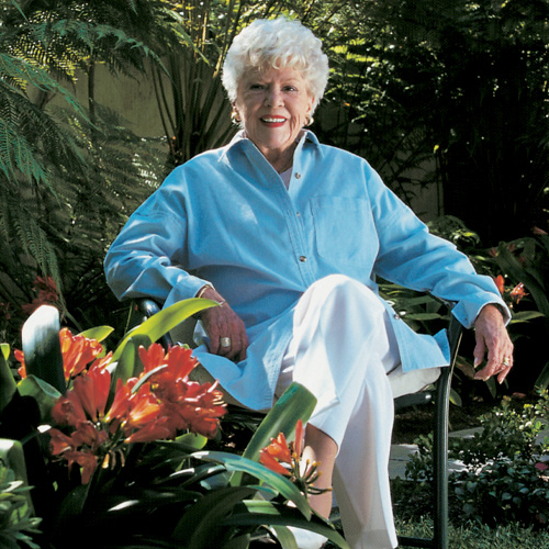 Image: Claire Trevor seated in the backyard of her home in Orange County.