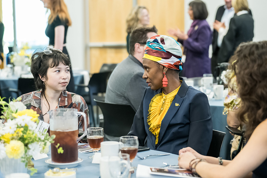 Image: Alex Eto Van Duyne and professor of dance S. Ama Wray at the Medici Circle Scholarship Luncheon. Photo by Jeanine Hill.