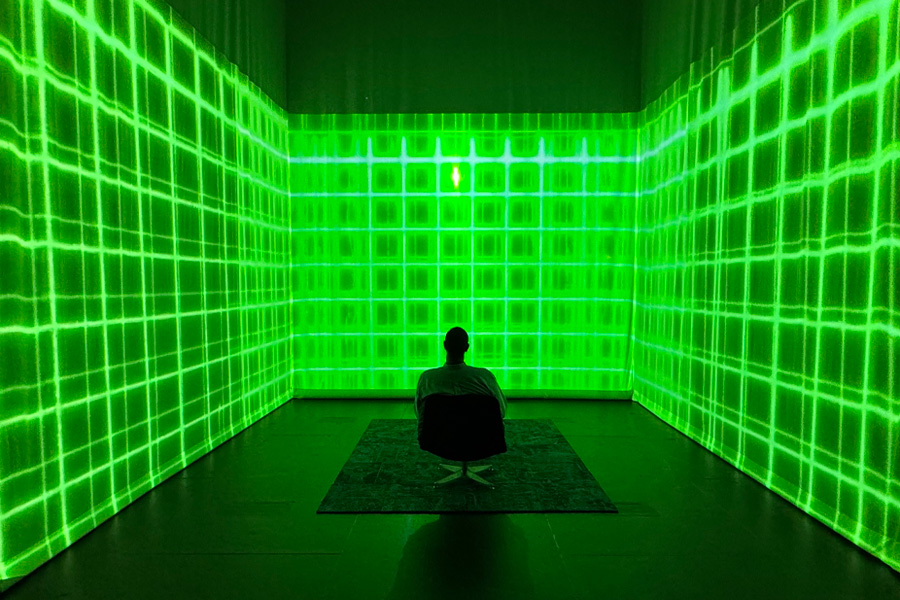 Image: Zebulon Zang’s Low Poly Disaster (2026), installed in the xMPL, reexamines early life simulation games and the ethics of player “misplay.” Photo by Jaime DeJong