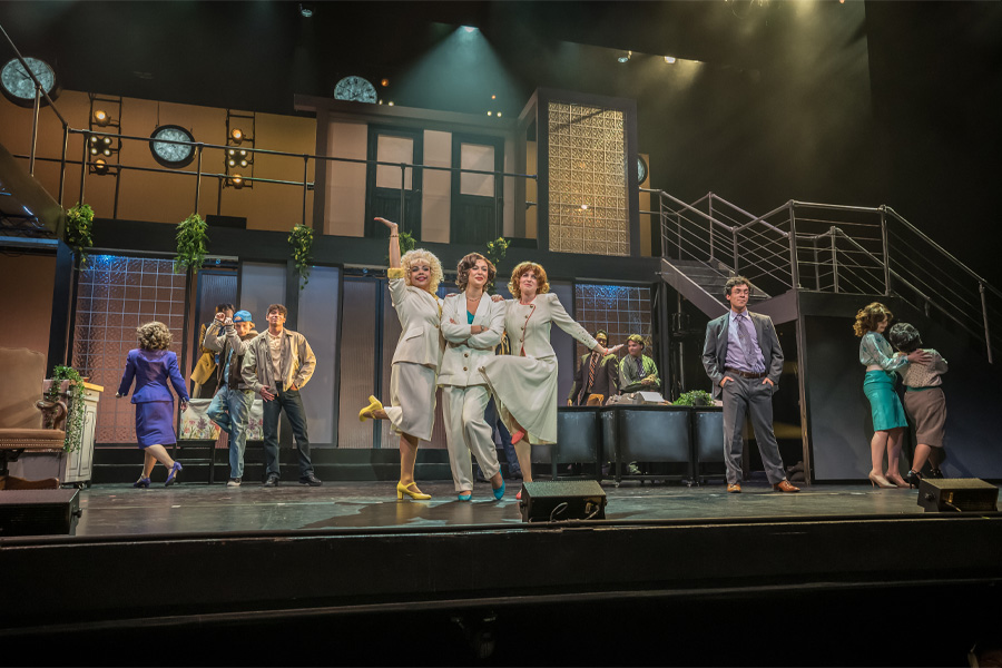 Image: (left to right) Ashlyn Filippone, Sloan Ptashek and Ruby Lapeyre in a performance of 9 to 5: The Musical in the Irvine Barclay Theatre. 