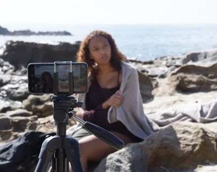 Drama M.F.A. student Hailey Byerly performs at the beach while being directed by acting professor Andrew Borba. (Photo by Philip Thompson)