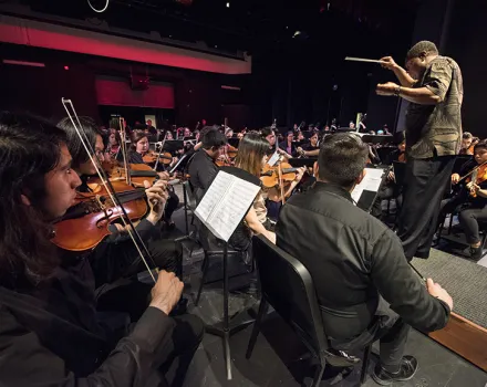Dr. Stephen Tucker conducting Santa Ana High School Symphony Orchestra
