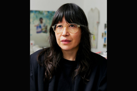 Person with bangs and glasses