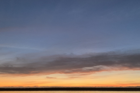 A sunset over a vast landscape