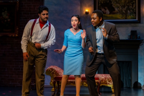 Opera performance with three characters on stage
