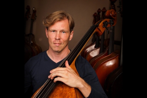 UCI Music Professor Matt Hare with double bass