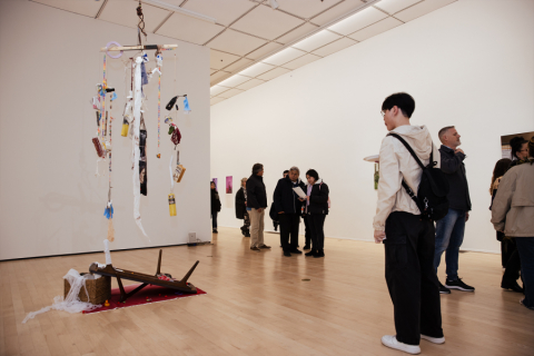 Patrons in an exhibition gallery